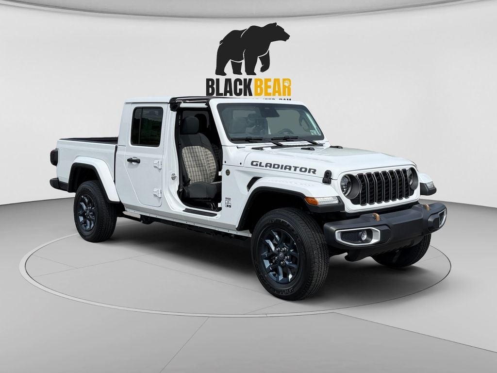 2026 Jeep Gladiator GLADIATOR 85TH ANNIVERSARY EDITION 4X4 in Bright White Clear-Coat Exterior Paint — front three-quarter view