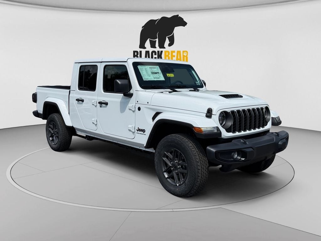 2026 Jeep Gladiator GLADIATOR SPORT S 4X4 in Bright White Clear-Coat Exterior Paint — front three-quarter view