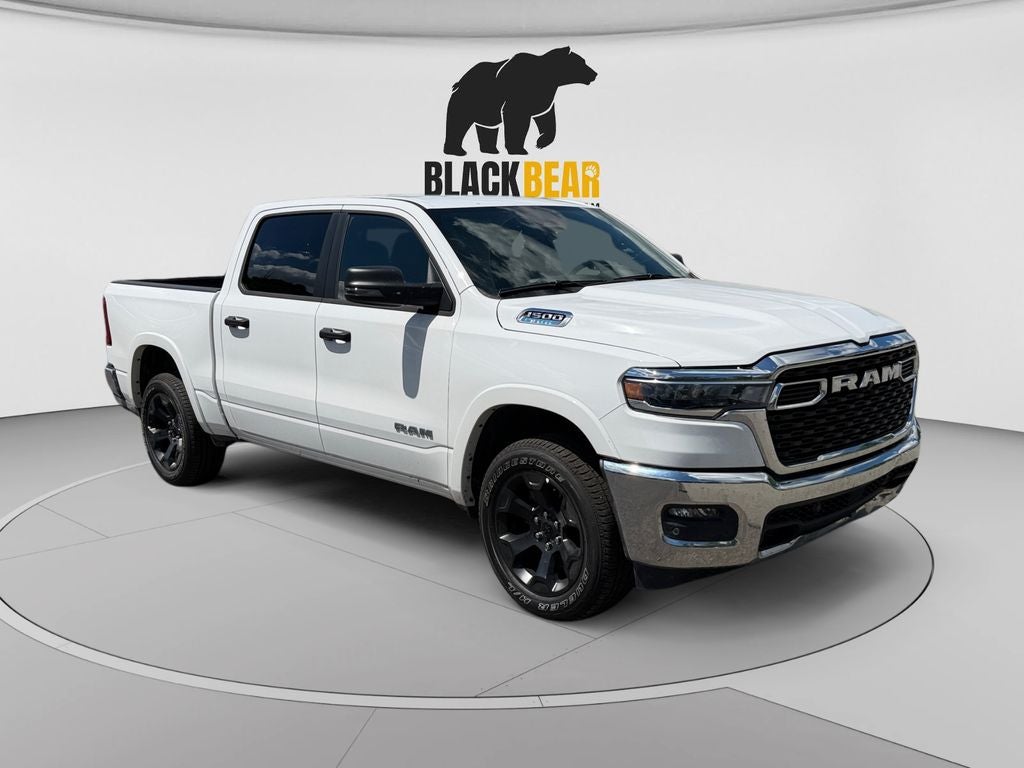 2025 RAM 1500 Big Horn Crew Cab 4x4 5'7' Box in Bright White Clearcoat — front three-quarter view