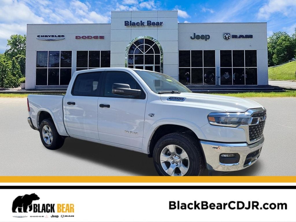 2026 RAM Ram 1500 RAM 1500 BIG HORN CREW CAB 4X4 5'7' BOX in Bright White Clear-Coat Exterior Paint — front three-quarter view