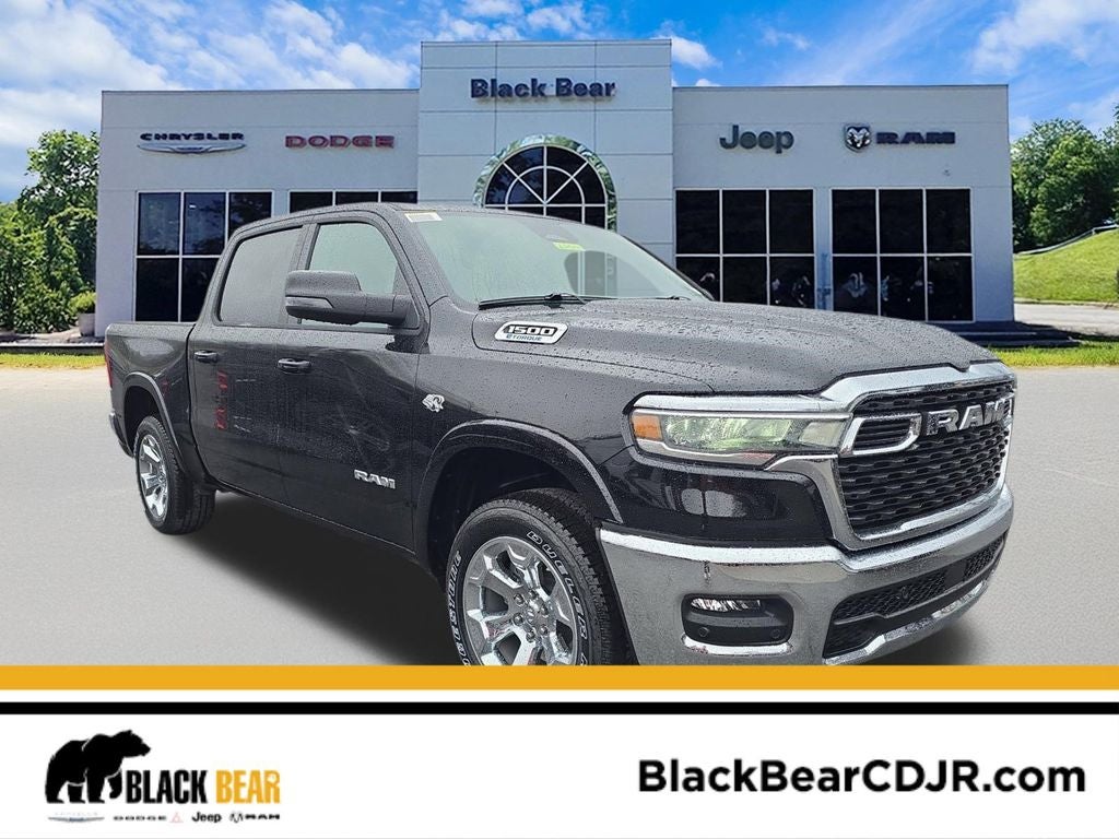 2026 RAM Ram 1500 RAM 1500 BIG HORN CREW CAB 4X4 5'7' BOX in Diamond Black Crystal Pearl-Coat Exterior Paint — front three-quarter view