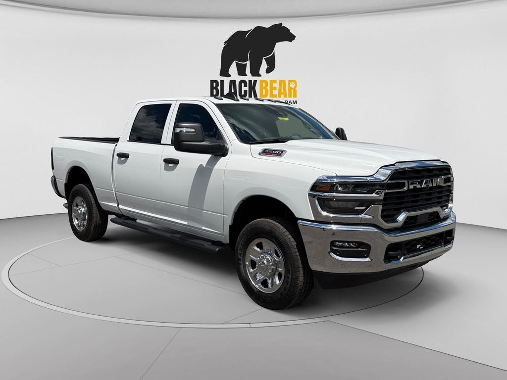 2026 RAM Ram 3500 RAM 3500 TRADESMAN CREW CAB 4X4 6'4' BOX in Bright White Clear-Coat Exterior Paint — front three-quarter view