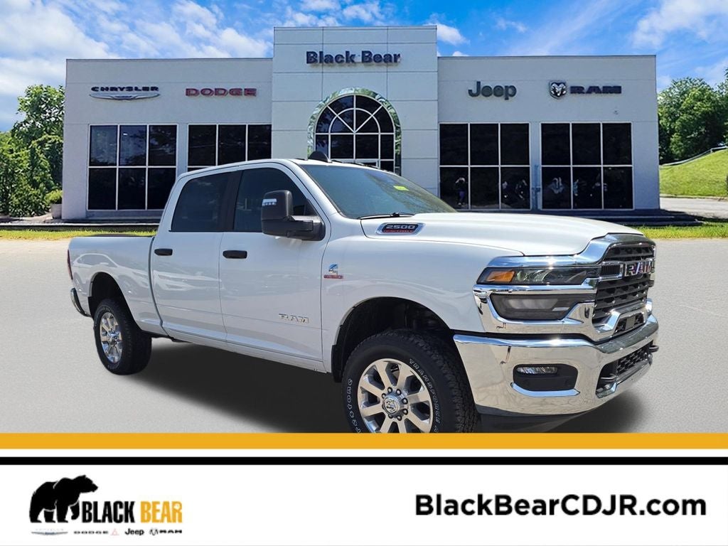 2026 RAM Ram 2500 RAM 2500 BIG HORN CREW CAB 4X4 6'4' BOX in Bright White Clear-Coat Exterior Paint — front three-quarter view